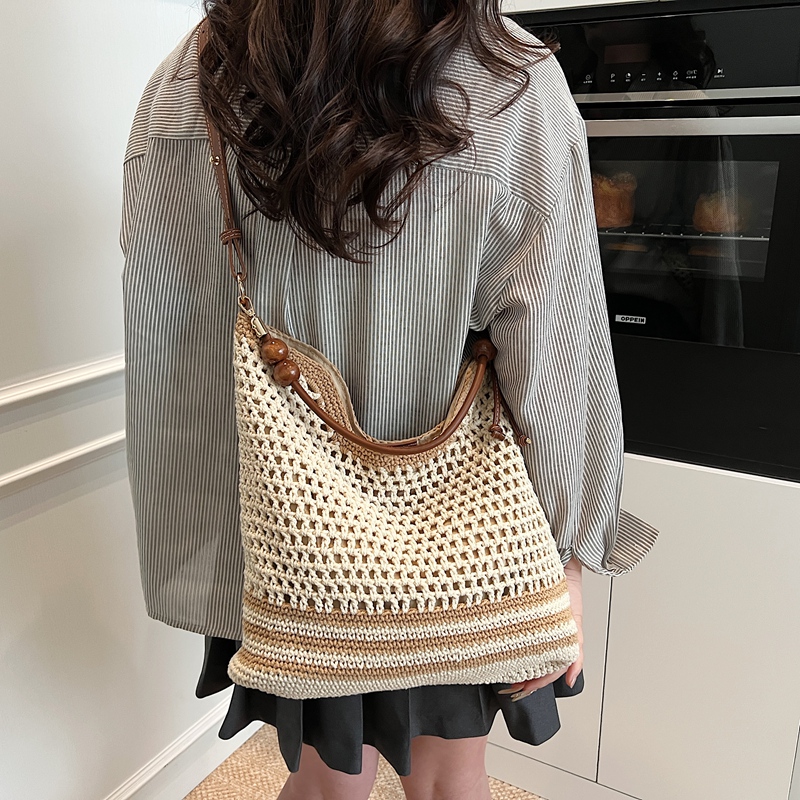 2025 Summer Woven Beach Bag for Women, Hollow Hand-Held Tote, Stylish Shoulder Crossbody for Commuting and Vacation 2025 Summer Woven Beach Bag for Women, Hollow Hand-Held Tote, Stylish Shoulder Crossbody for Commuting and Vacation