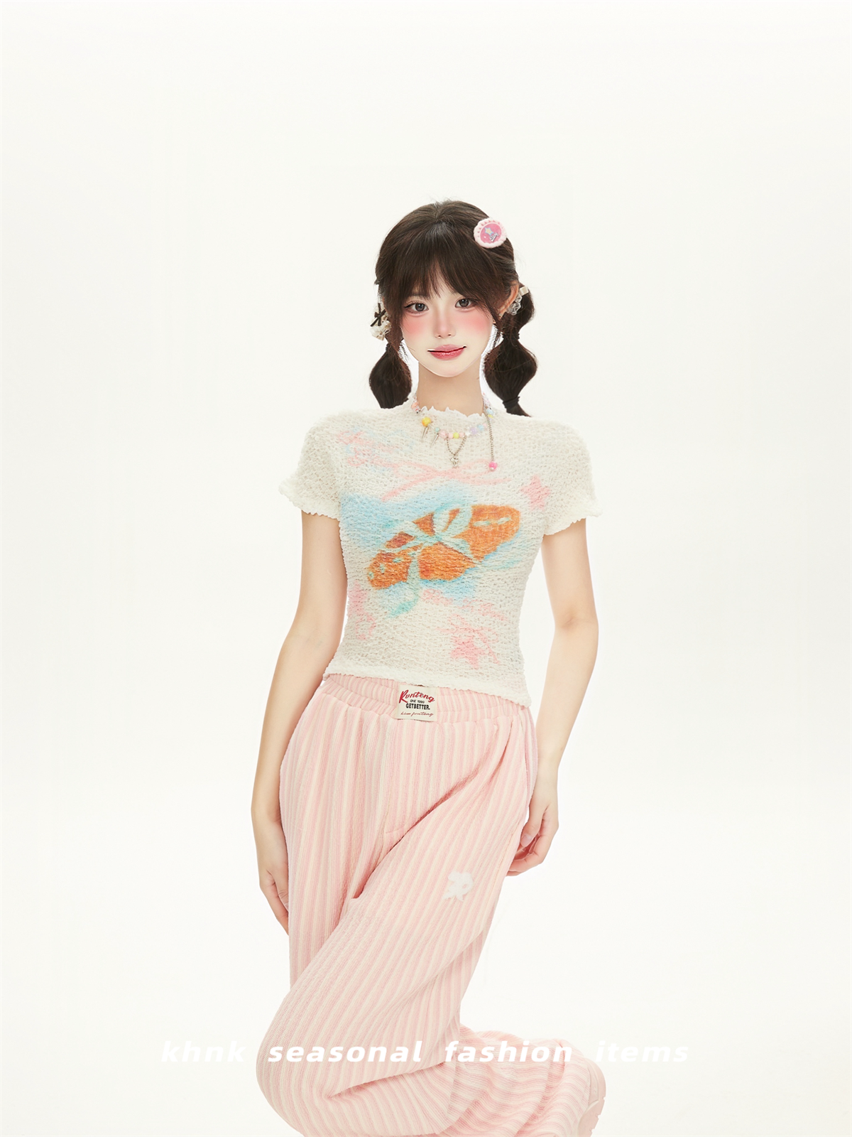 Chic Pink Printed High-Elastic Slim Short-Sleeve T-Shirt for Women with Ruffled Edges - Perfect Summer Top for Sweet Girl Style Chic Pink Printed High-Elastic Slim Short-Sleeve T-Shirt for Women with Ruffled Edges - Perfect Summer Top for Sweet Girl Style