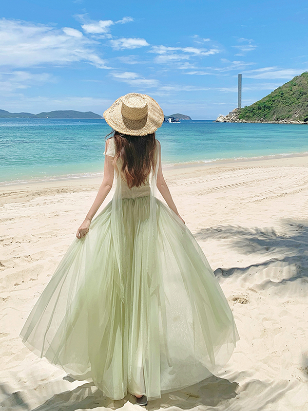 French-Style Green Mesh Spaghetti Strap Dress for Women - Summer Seaside Vacation Long Skirt, Perfect for Stunning Photos French-Style Green Mesh Spaghetti Strap Dress for Women - Summer Seaside Vacation Long Skirt, Perfect for Stunning Photos