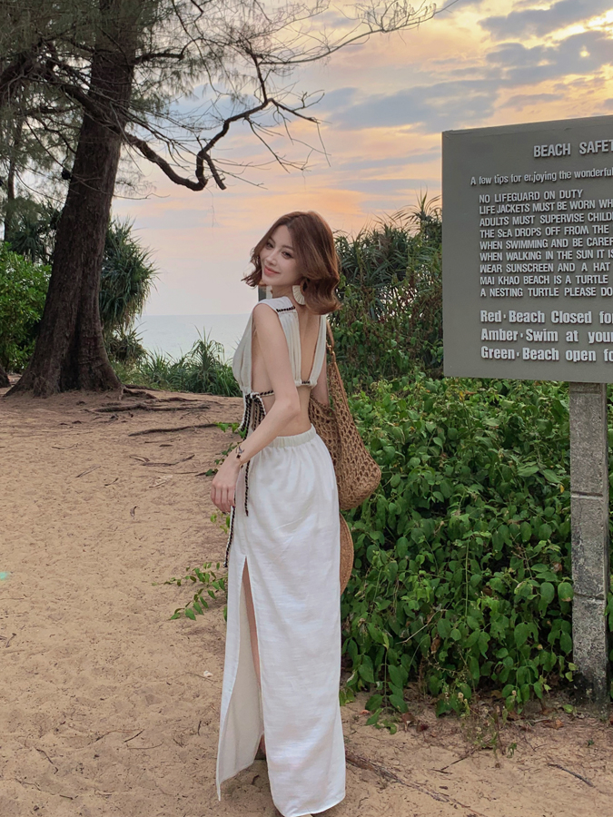 French-Style Waist-Cinching Spaghetti Strap Dress with Hollow Back - Feminine Linen Vacation Beach Dress for Summer French-Style Waist-Cinching Spaghetti Strap Dress with Hollow Back - Feminine Linen Vacation Beach Dress for Summer