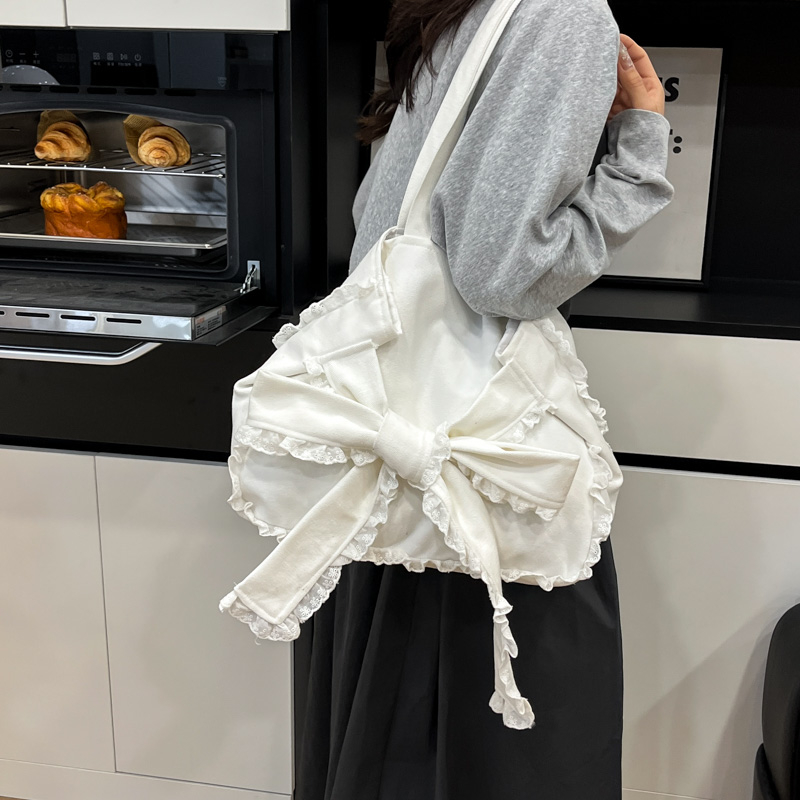 Korean Style Sweet Bow Canvas Tote Bag for Women – Trendy 2025 Large Capacity Versatile Handbag Korean Style Sweet Bow Canvas Tote Bag for Women – Trendy 2025 Large Capacity Versatile Handbag