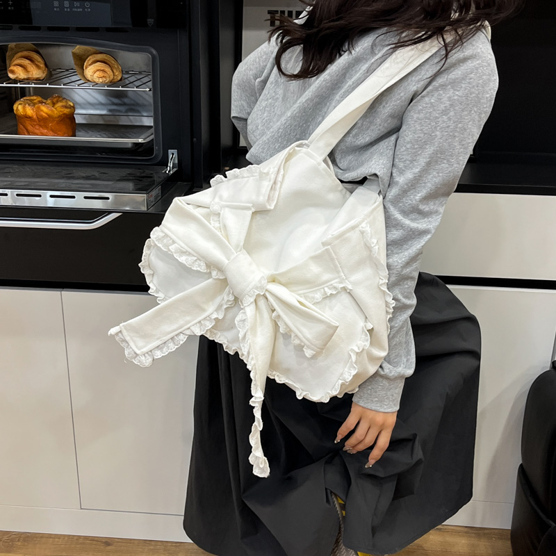 Korean Style Sweet Bow Canvas Tote Bag for Women – Trendy 2025 Large Capacity Versatile Handbag Korean Style Sweet Bow Canvas Tote Bag for Women – Trendy 2025 Large Capacity Versatile Handbag