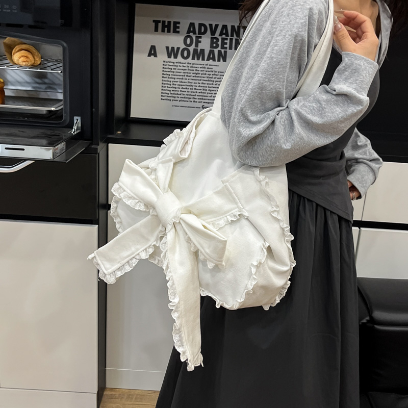 Korean Style Sweet Bow Canvas Tote Bag for Women – Trendy 2025 Large Capacity Versatile Handbag Korean Style Sweet Bow Canvas Tote Bag for Women – Trendy 2025 Large Capacity Versatile Handbag