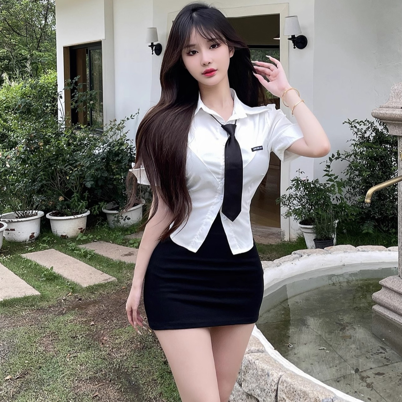 Sexy Two-Piece JK Uniform Set with Waist-Cinching Short-Sleeve White Shirt and Pleated Skirt for Nightclub & Party Wear