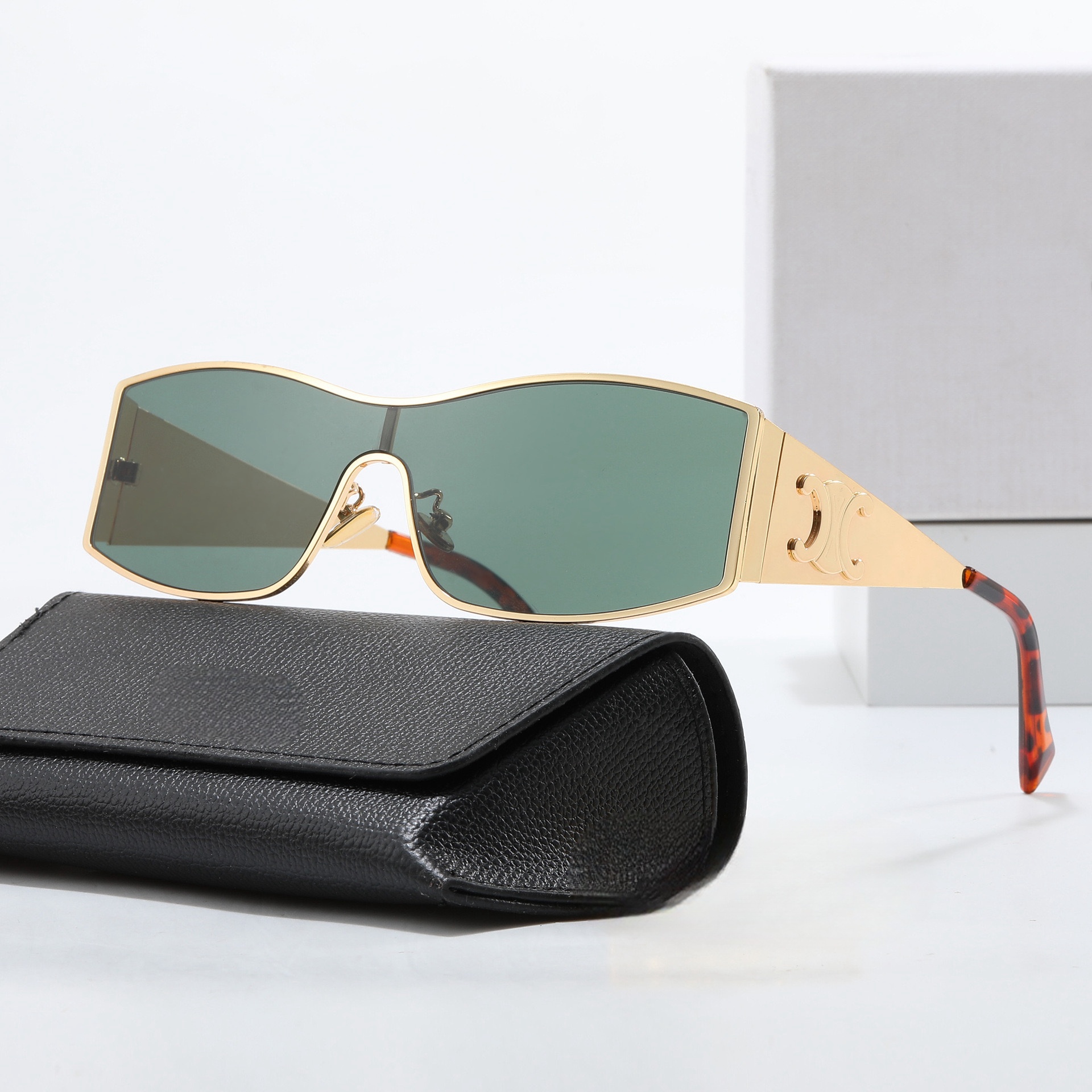 Trendy One-Piece Metallic Sunglasses for Women – High-End European & American Style, Flattering for Round & Square Faces Trendy One-Piece Metallic Sunglasses for Women – High-End European & American Style, Flattering for Round & Square Faces