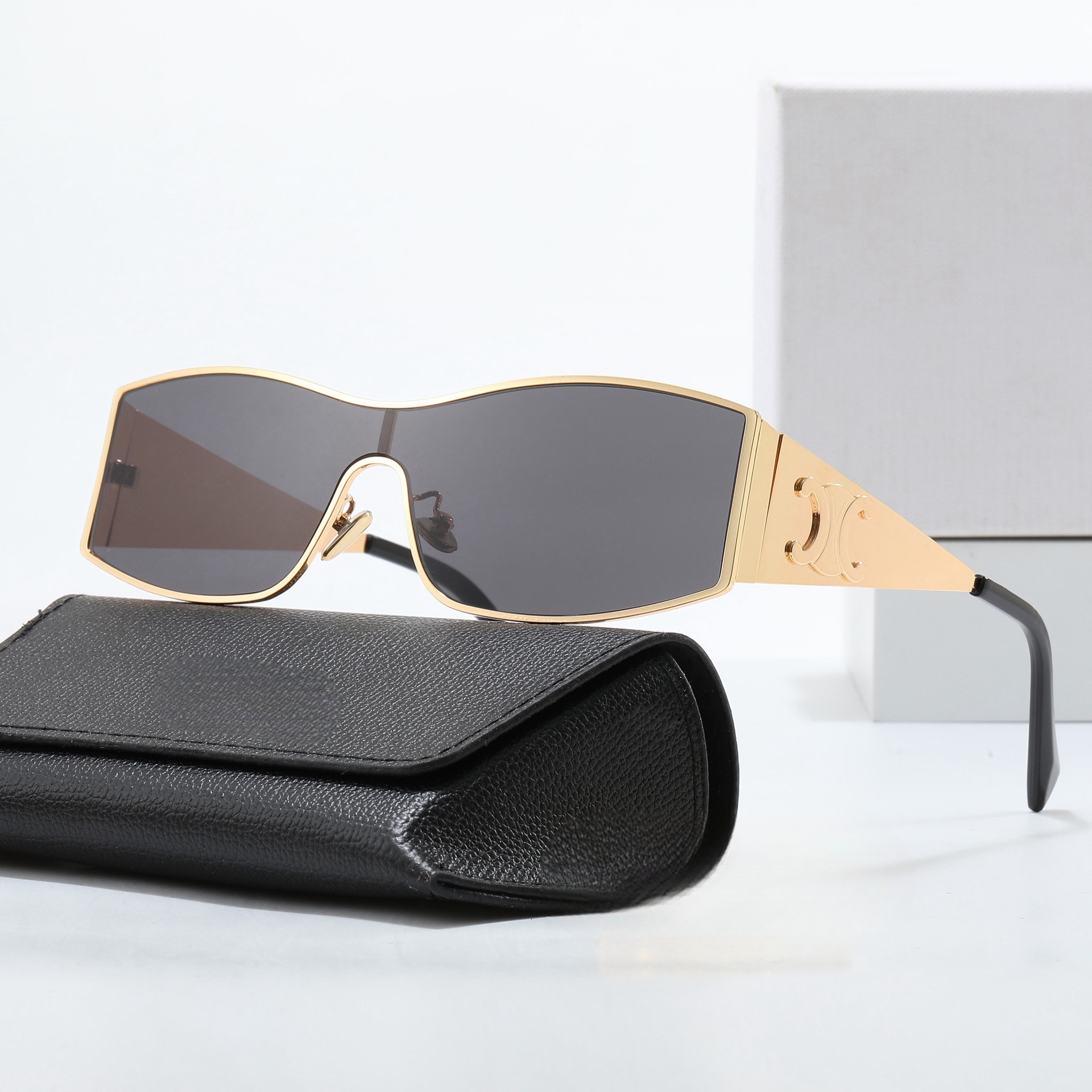 Trendy One-Piece Metallic Sunglasses for Women – High-End European & American Style, Flattering for Round & Square Faces Trendy One-Piece Metallic Sunglasses for Women – High-End European & American Style, Flattering for Round & Square Faces