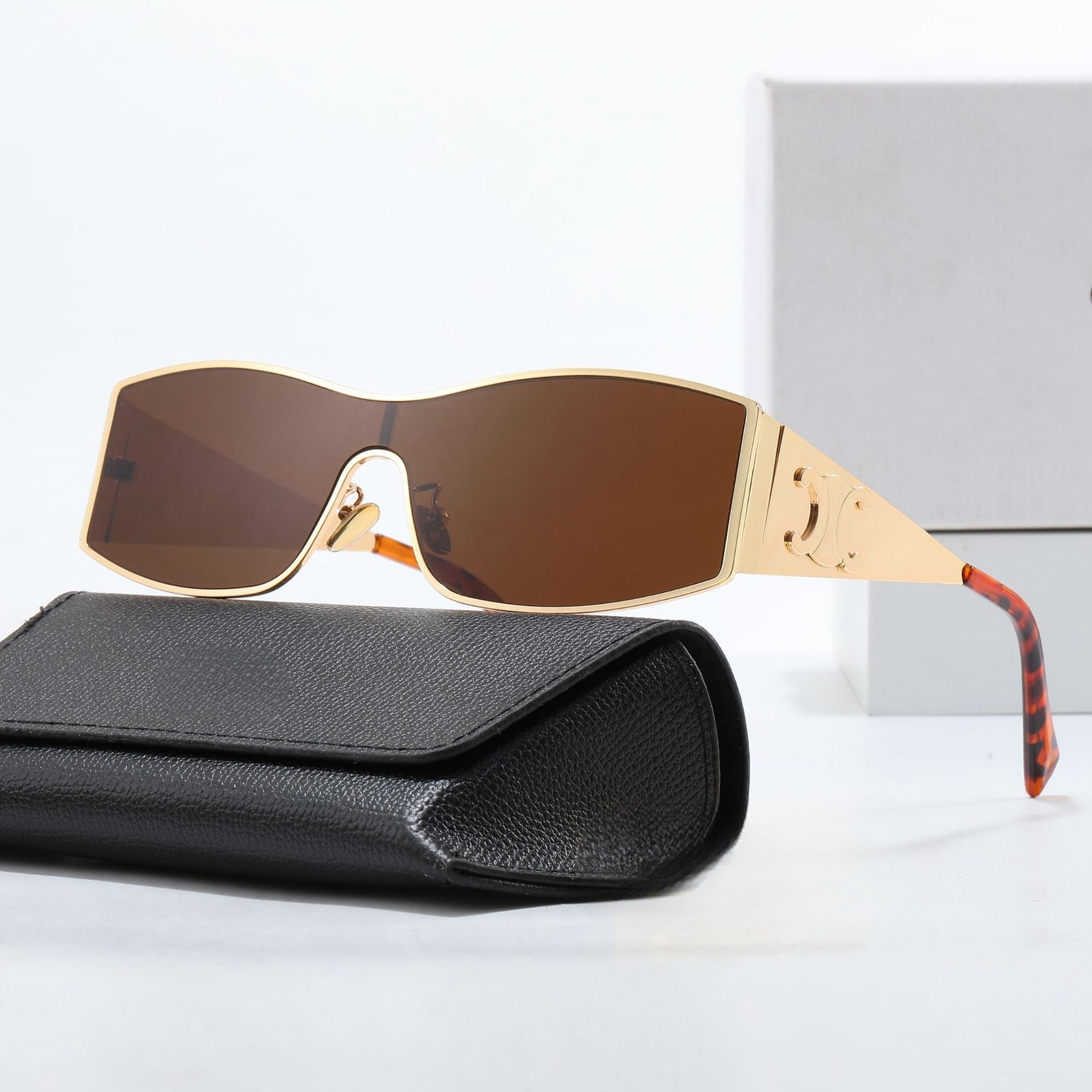 Trendy One-Piece Metallic Sunglasses for Women – High-End European & American Style, Flattering for Round & Square Faces Trendy One-Piece Metallic Sunglasses for Women – High-End European & American Style, Flattering for Round & Square Faces