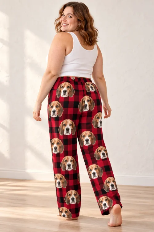 Woman glancing back over her shoulder in red plaid beagle pajamas womens, faces down the back of both legs, sunny studio