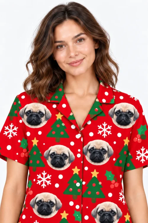 Close-up of the collar and buttons on the red Christmas pajama shirt with pug faces