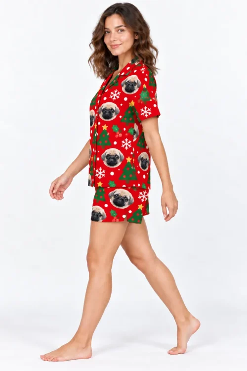 Side view of a woman walking in the red Christmas pet face pajama set
