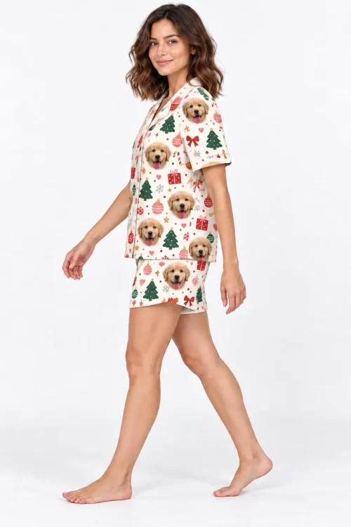 Side view of a woman walking in the cream Christmas pet face pajama set