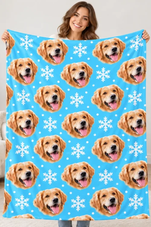 Woman holding up the portrait dog face fleece blanket to show its size