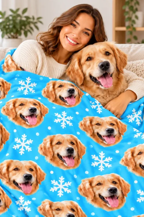 Woman cuddling her golden retriever under the dog face fleece blanket