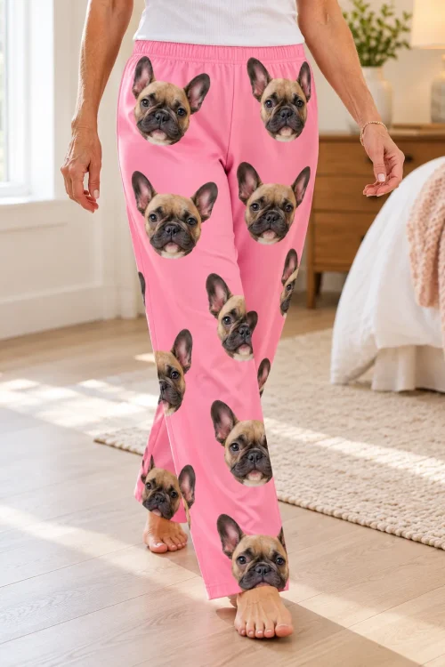 Woman walking barefoot across a bedroom, close view of pink French bulldog pajamas for women