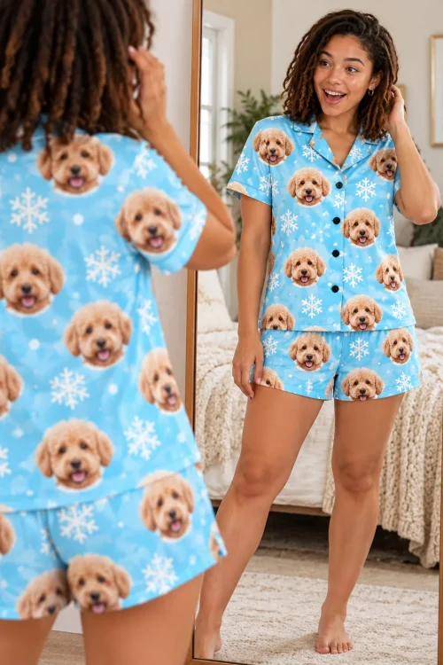 Woman checking the back of her snowflake golden doodle pajama set in a bedroom mirror
