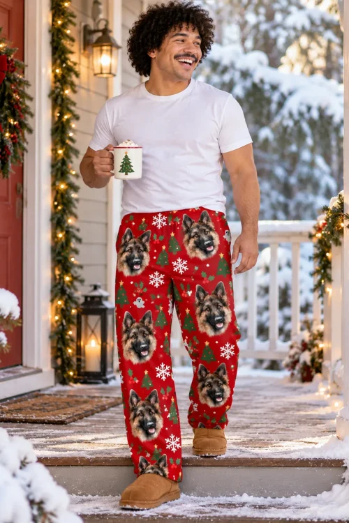 Laughing man holding cocoa on a snowy front porch in Christmas men's german shepherd pajama pants