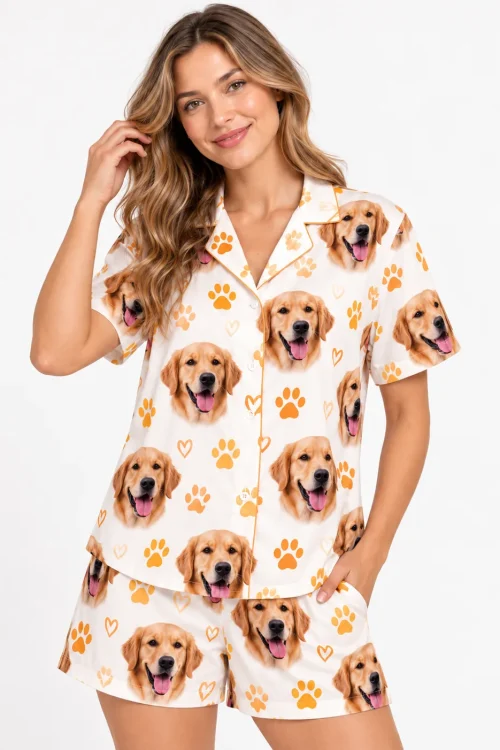 Close-up of the camp collar shirt in the pet face pajama set, golden retriever faces and paws