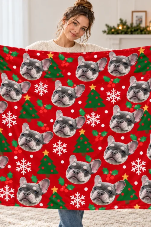 Woman holding up the pet face blanket to show its size, French bulldog Christmas print