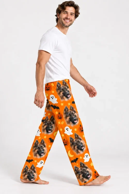 Side view of men's pet face pajama pants mid-step