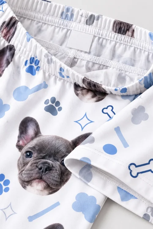 Inside of pet face pajama pants: elastic waistband and blank label, French bulldog print