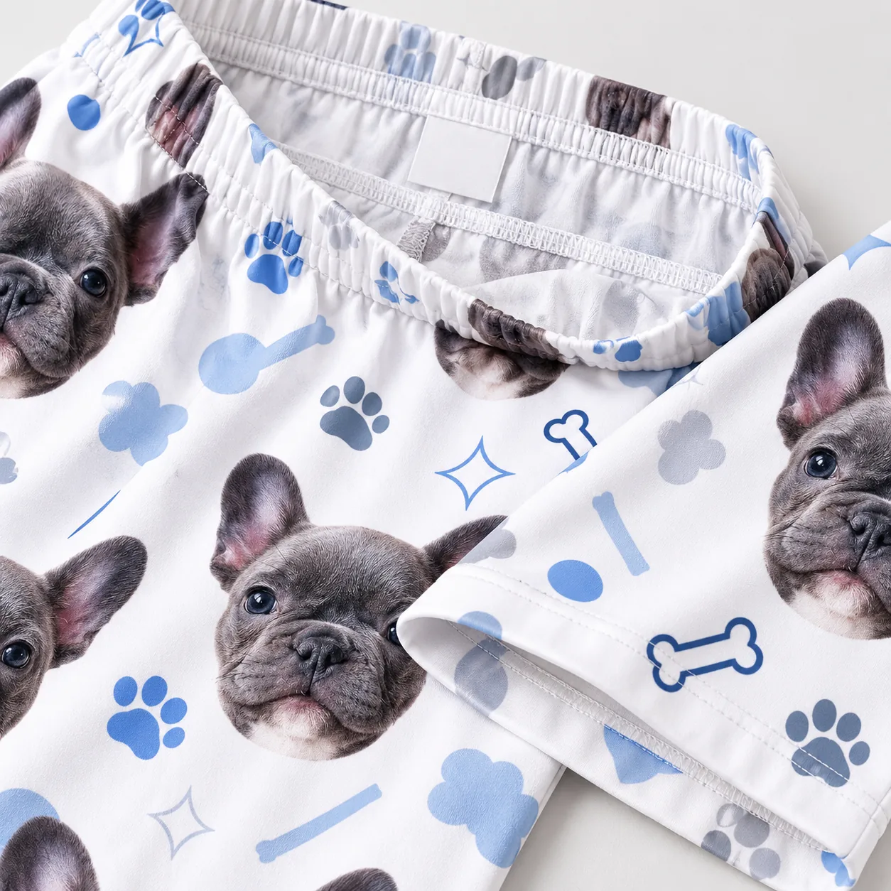 Custom Pet Face Pajama Pants — inside waistband | GenzOutfit Inside of pet face pajama pants: elastic waistband and blank label, French bulldog print