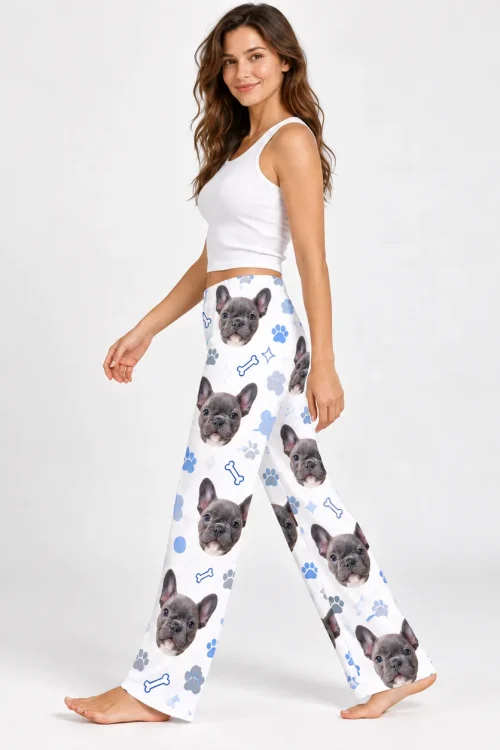 Side view of women's pet face pajama pants mid-step, showing the relaxed leg