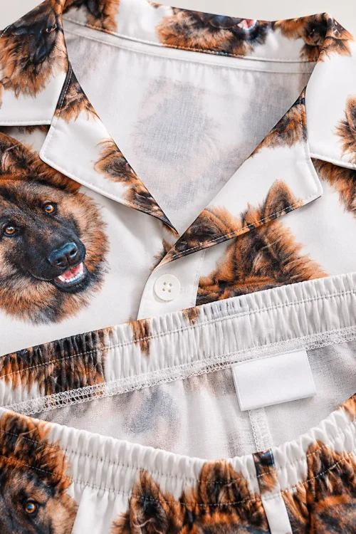 Inside of the men's pet face pajama shorts: elastic waistband and blank label