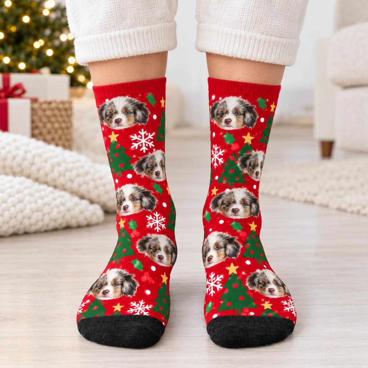 Feet in red Christmas crew socks printed with an Australian shepherd's face, showing sock size and height