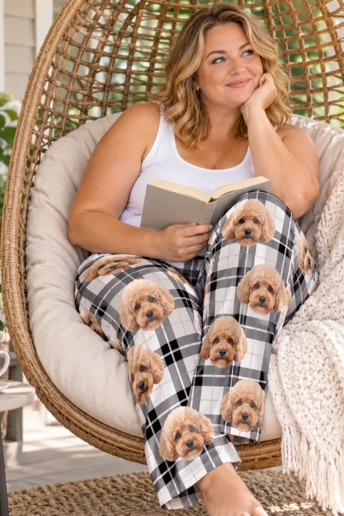 Woman reading in a hanging wicker chair on a porch, in white plaid poodle pajamas for women